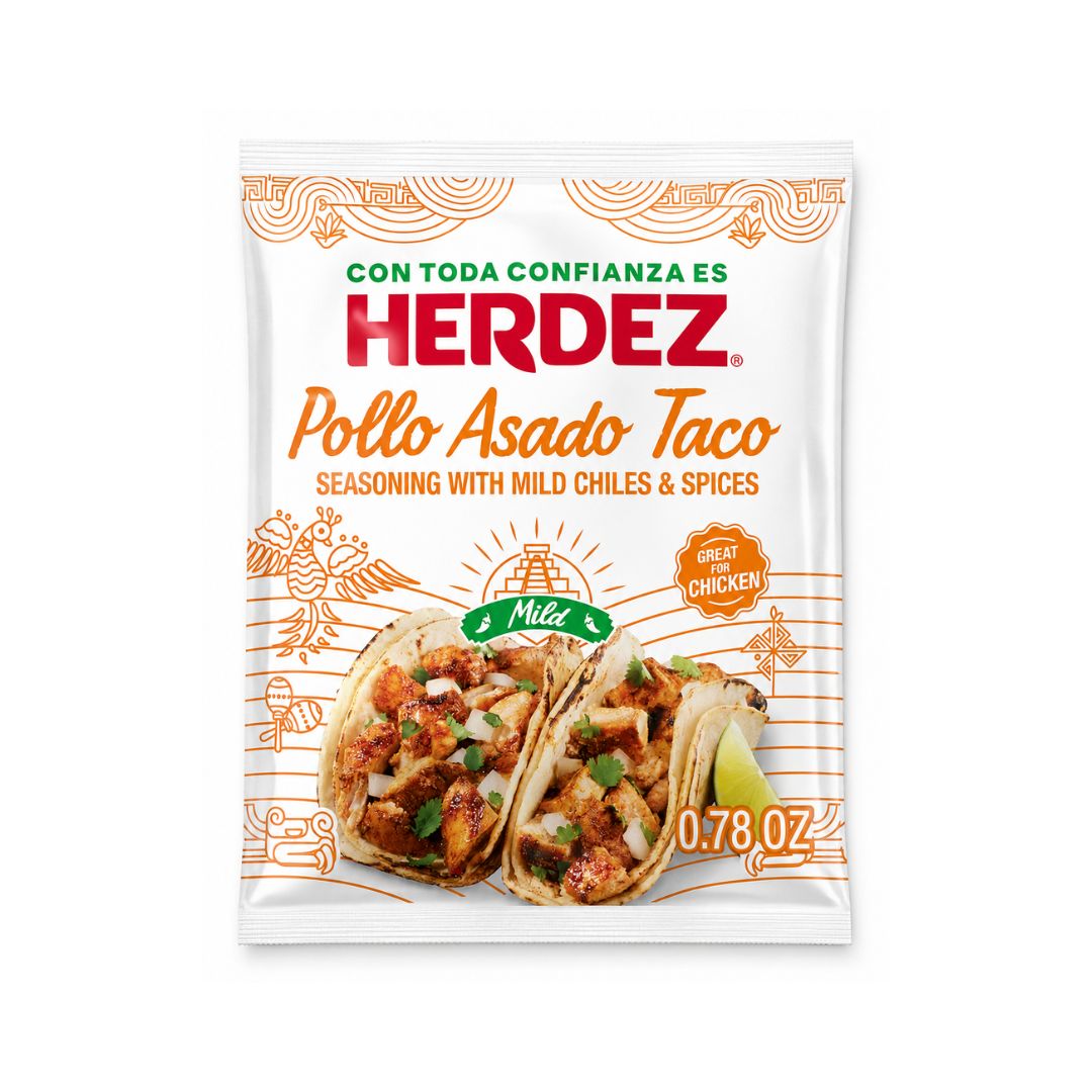 Herdez Pollo Asado Taco seasoning packet on a white background
