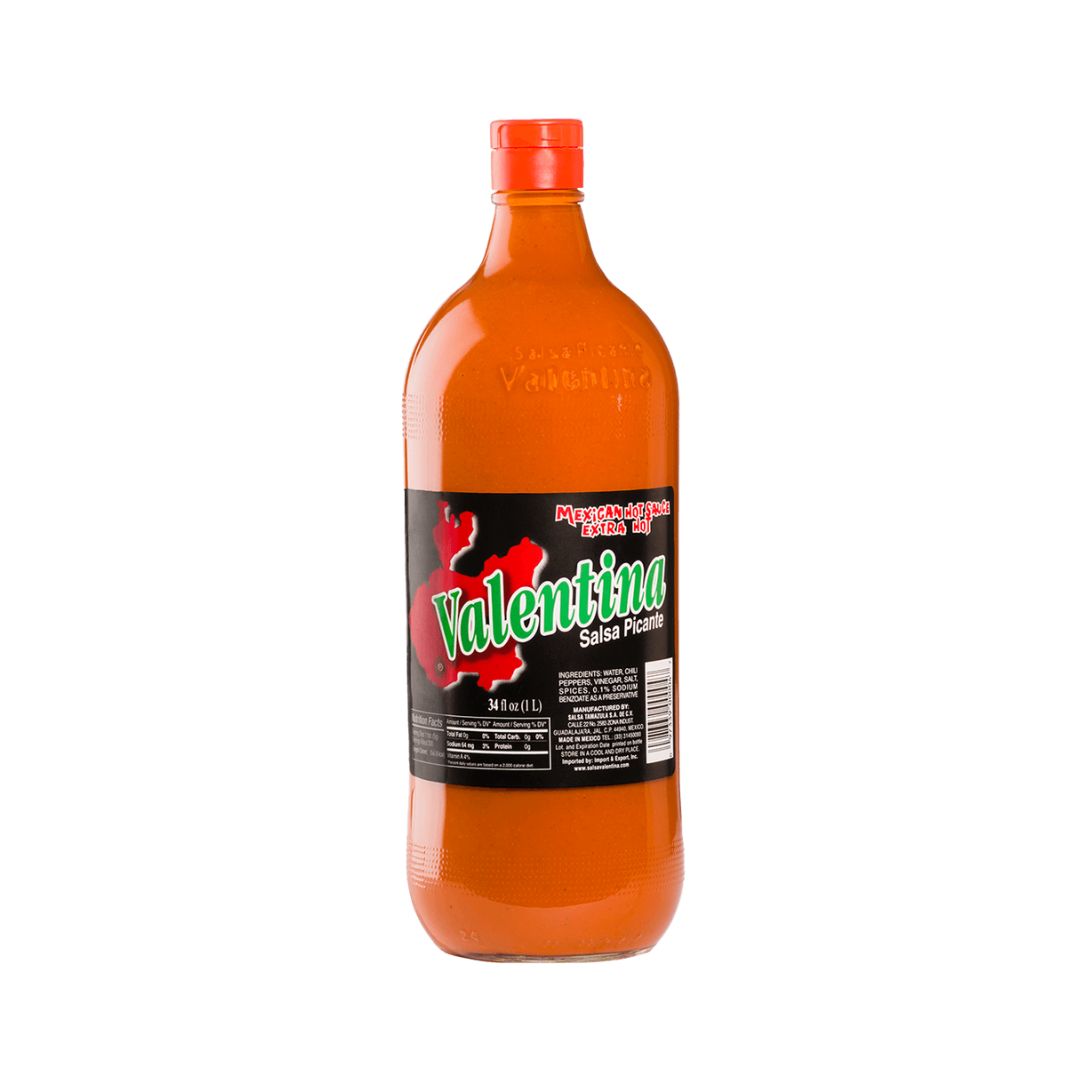 Bottle of Valentina hot sauce on a white background