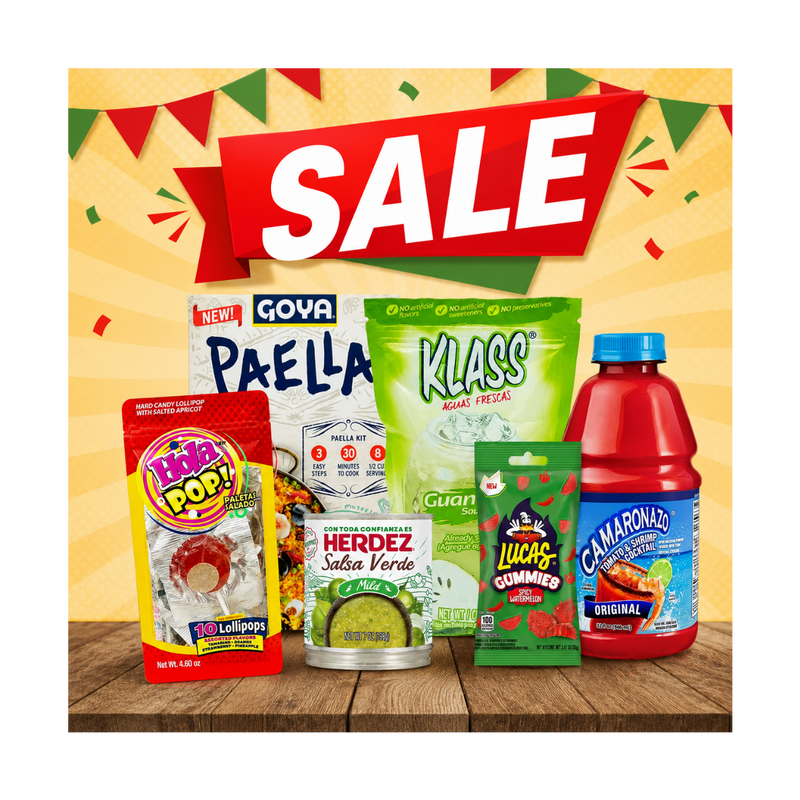 A collection of assorted Mexican snacks and drinks displayed on a wooden table under a large red 'SALE' banner. The products include a bag of Goya Paella, a green bag of Klass Salsa Verde, a red bag of Hula Pop! Lollipops, a tin of Herdez Salsa Verde, a bag of Lucas Gummy Rots, and a bottle of Camarón Original.